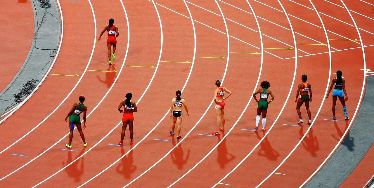 Runners on a running track
