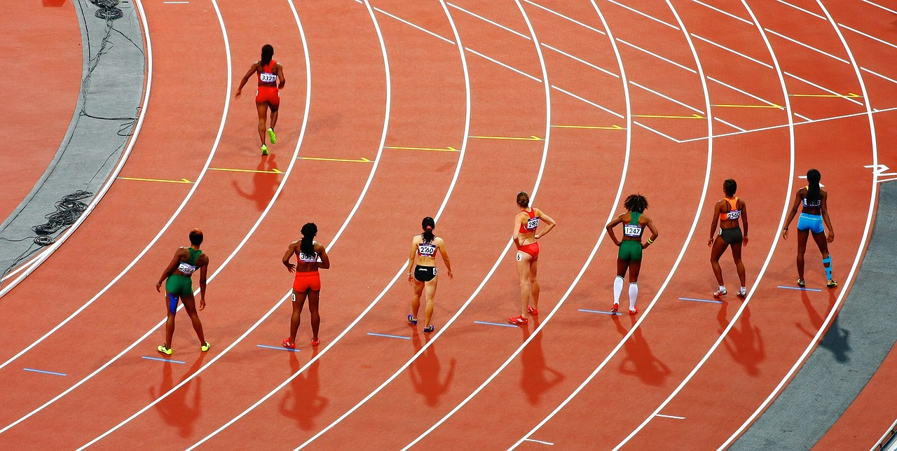 Runners on a race track