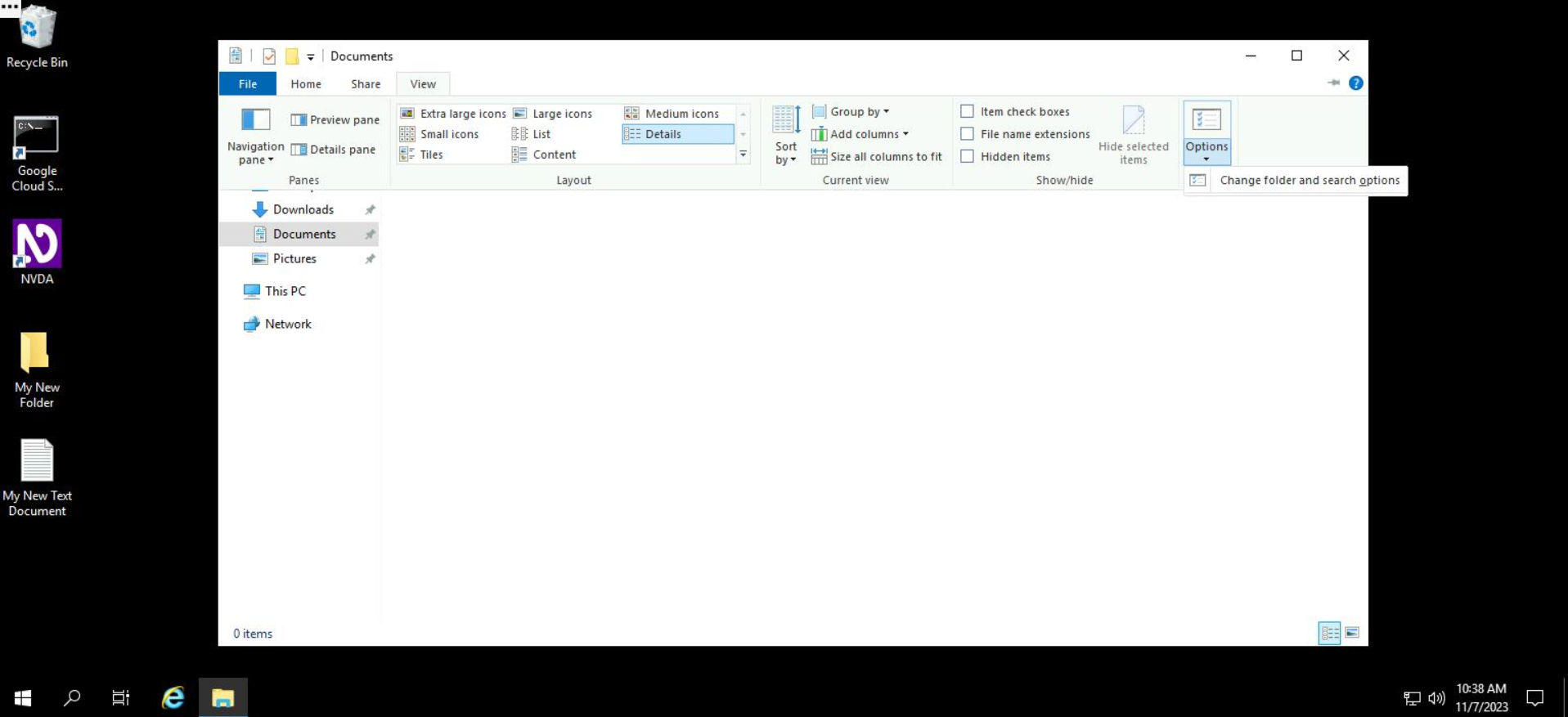 Screenshot of File Explorer accessing the "View" tab from the File Explorer Menu. The "Options" menu has been selected, with the cursor highlighting the option "Change Folder and Search Options".