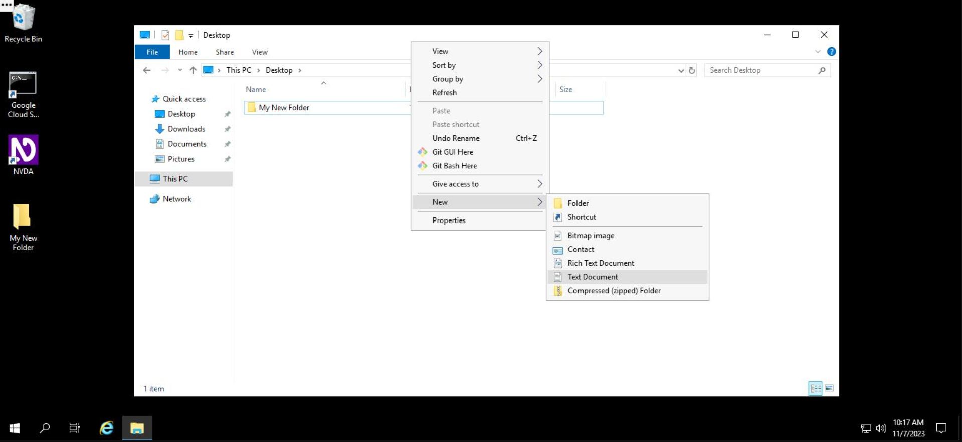 Screenshot of a Windows desktop, open to File Explorer. Within File Explorer, the user has selected "This PC" and then "Desktop" and has accessed the right-click / context menu for "Desktop". Within the right-click / context menu, the user has selected "New" and then "Text Document" with their cursor to create a new text document on the Desktop.
